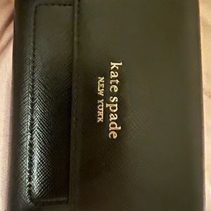 Kate Spade booked trifold flap wallet